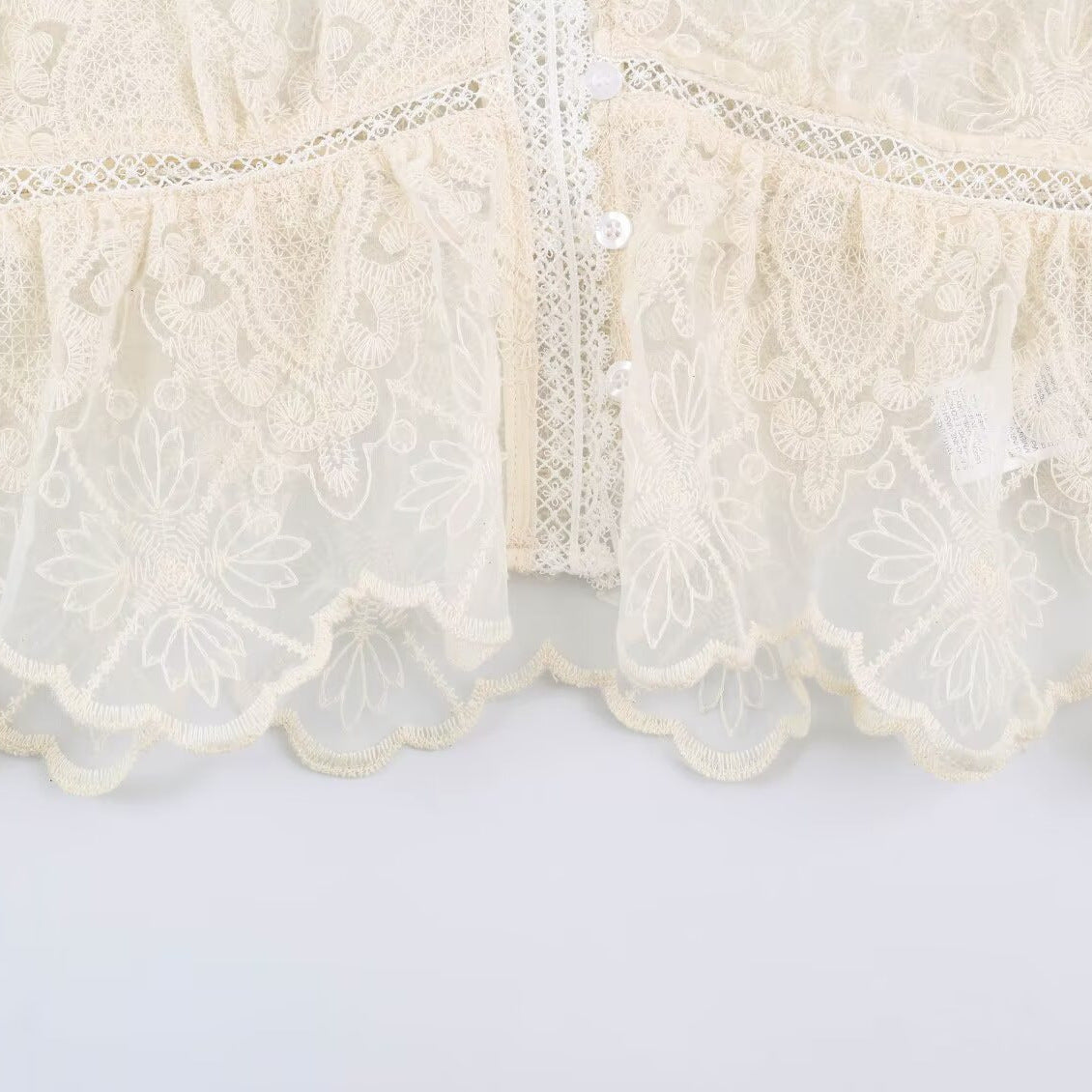Lace patchwork flared sleeve top